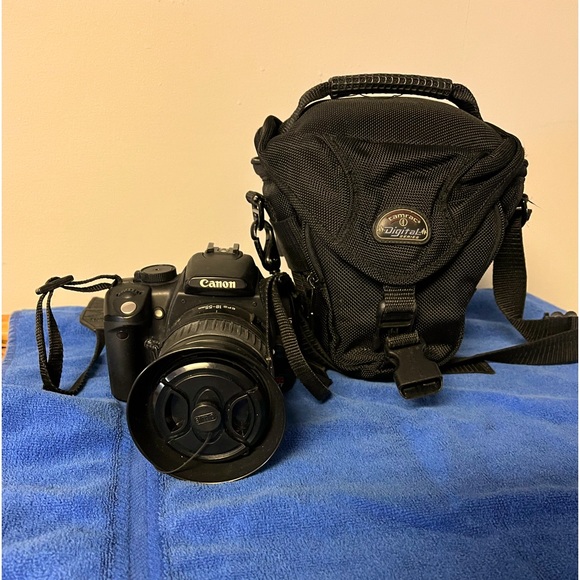 Cannon Rebel XT with battery charger & carry case